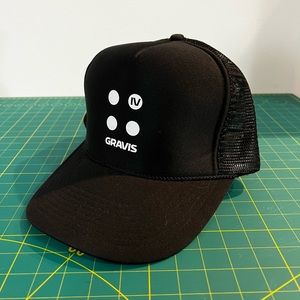 Travis IV Black Trucker Hat
